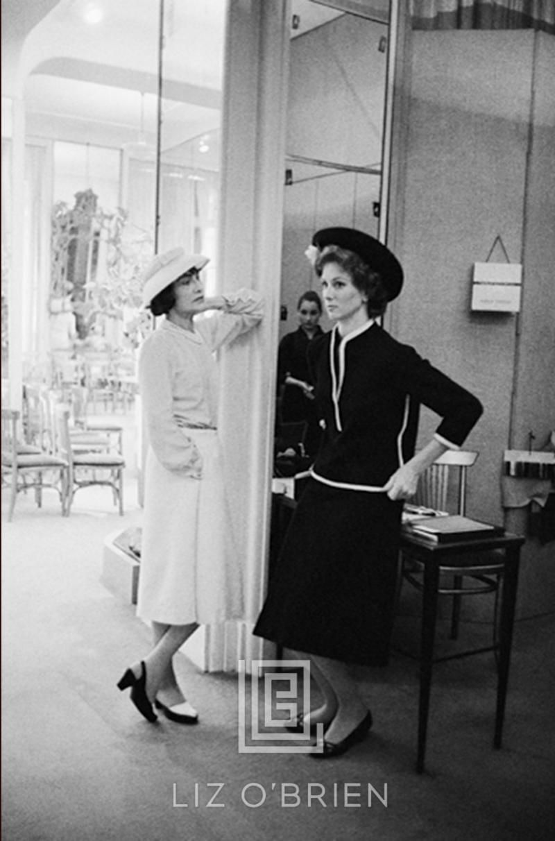 Mark Shaw Coco Chanel with Suzy Parker in Dark Suit