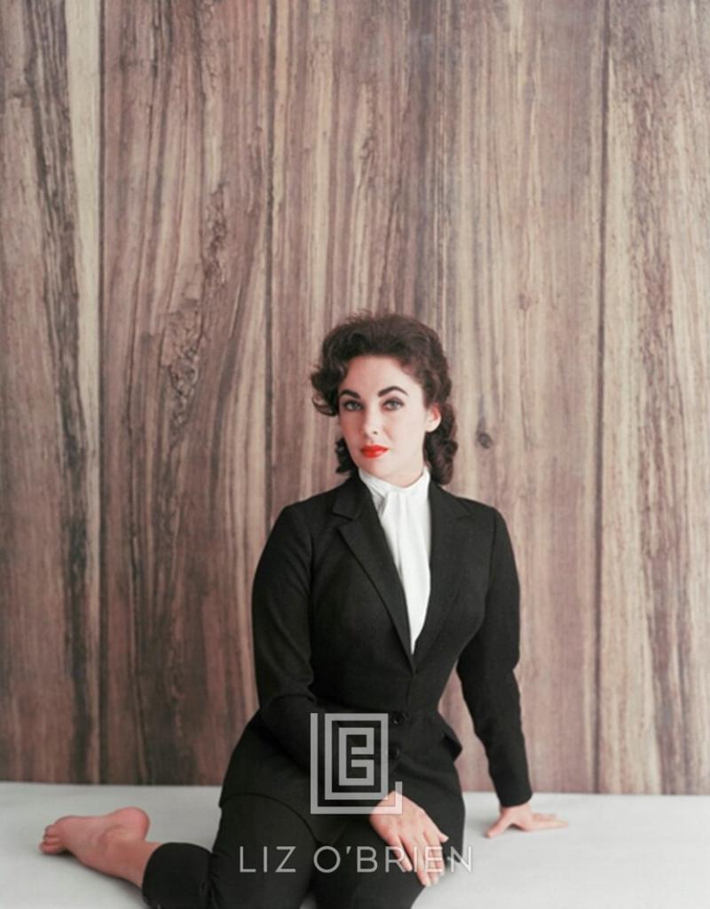 Mark Shaw Elizabeth Taylor Black Suit Sits to the Side 1956