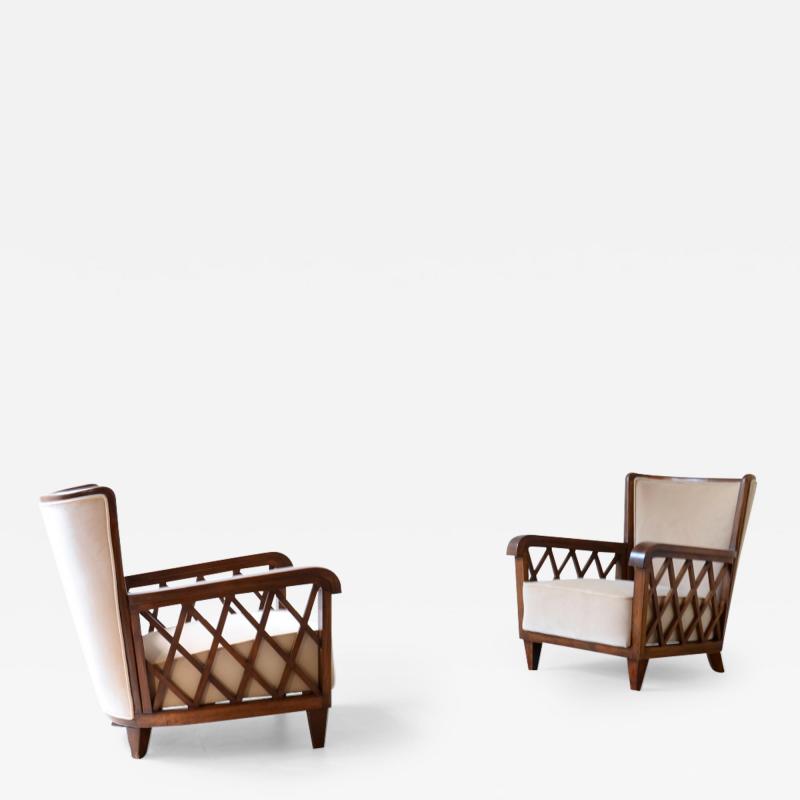 Maurizio Tempestini Pair of armchairs in shaped wood and padded fabric