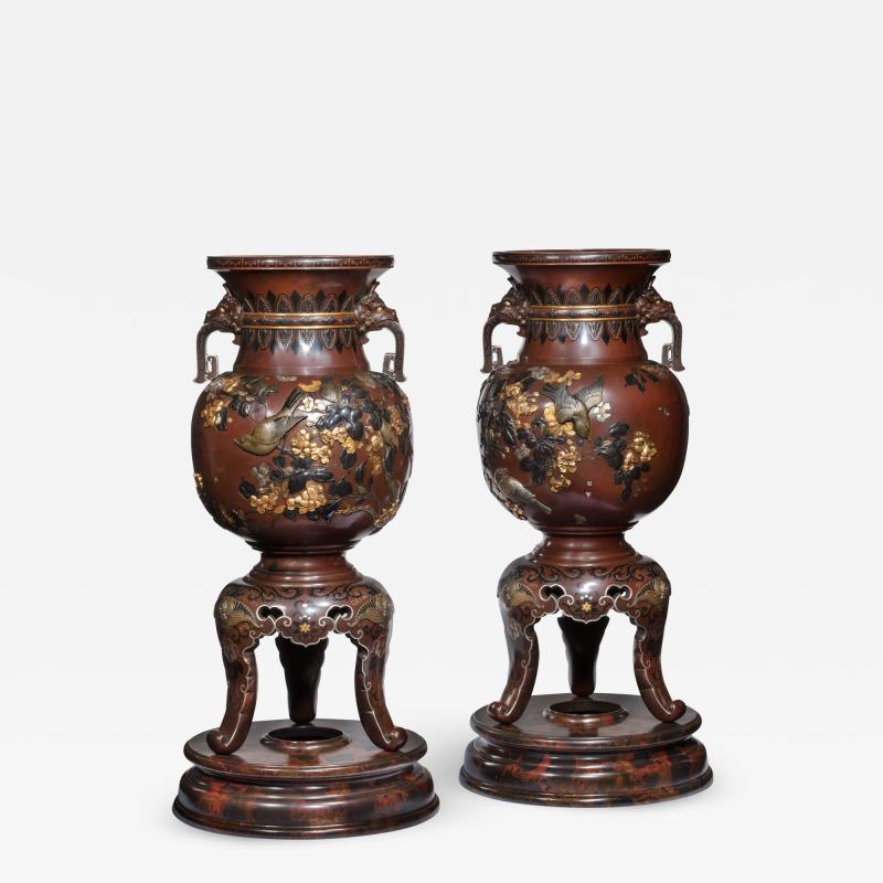 Meiji period rotating bronze and mixed metal vases