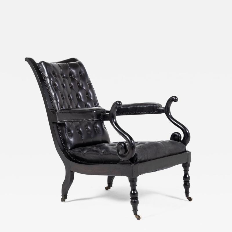 Mid 19th Century Ebonised and Leather Library Armchair