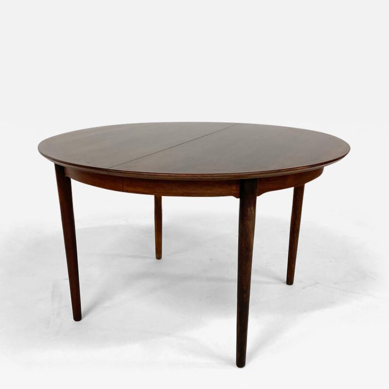 Mid Century Modern Round Extendable Dining Table