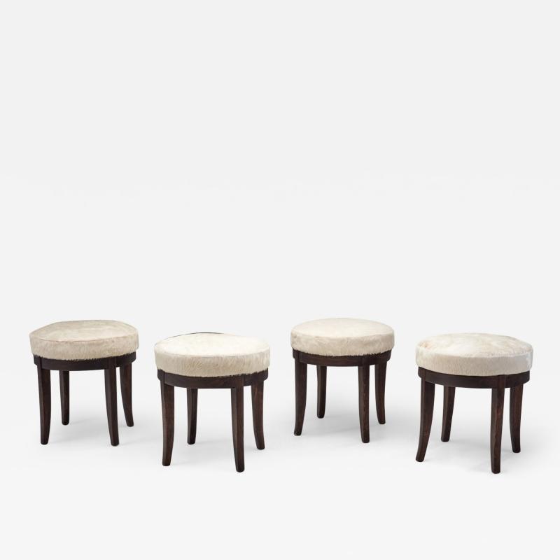 Mid Century Modern Set of Four Stools in Cowhide Europe ca 1950s