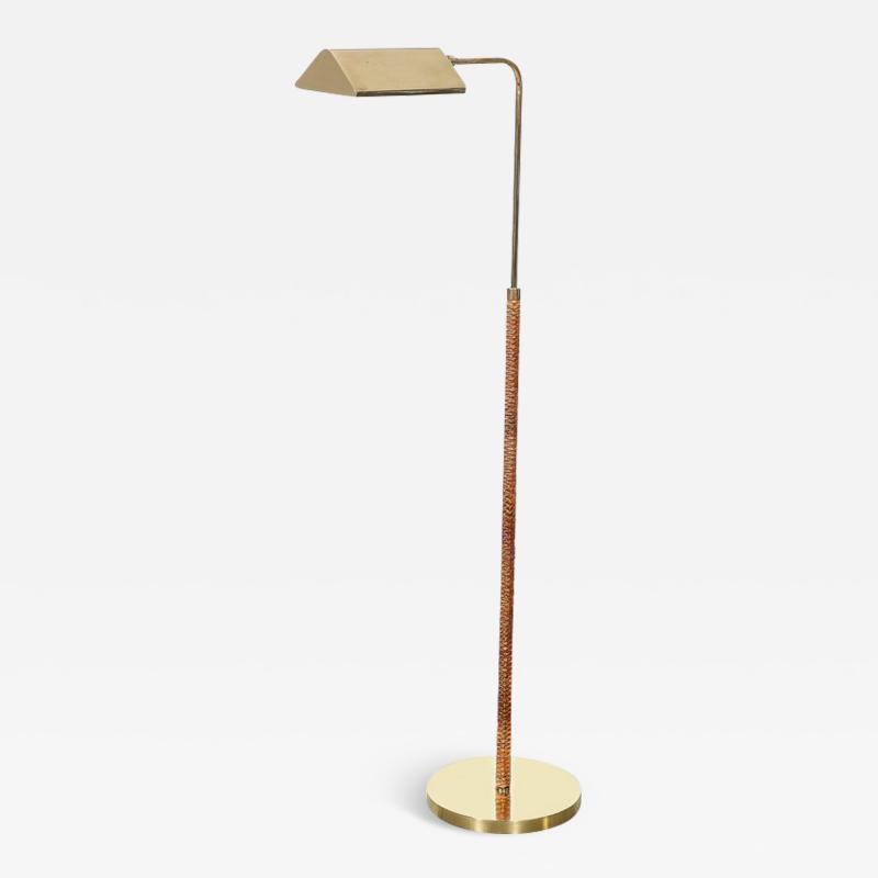Mid Century Modernist Articulating Polished Brass and Ratan Wrapped Floor Lamp