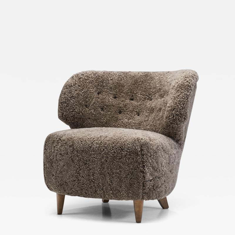 Mid Century Scandinavian Lounge Chair in Sheepskin Scandinavia circa 1950s