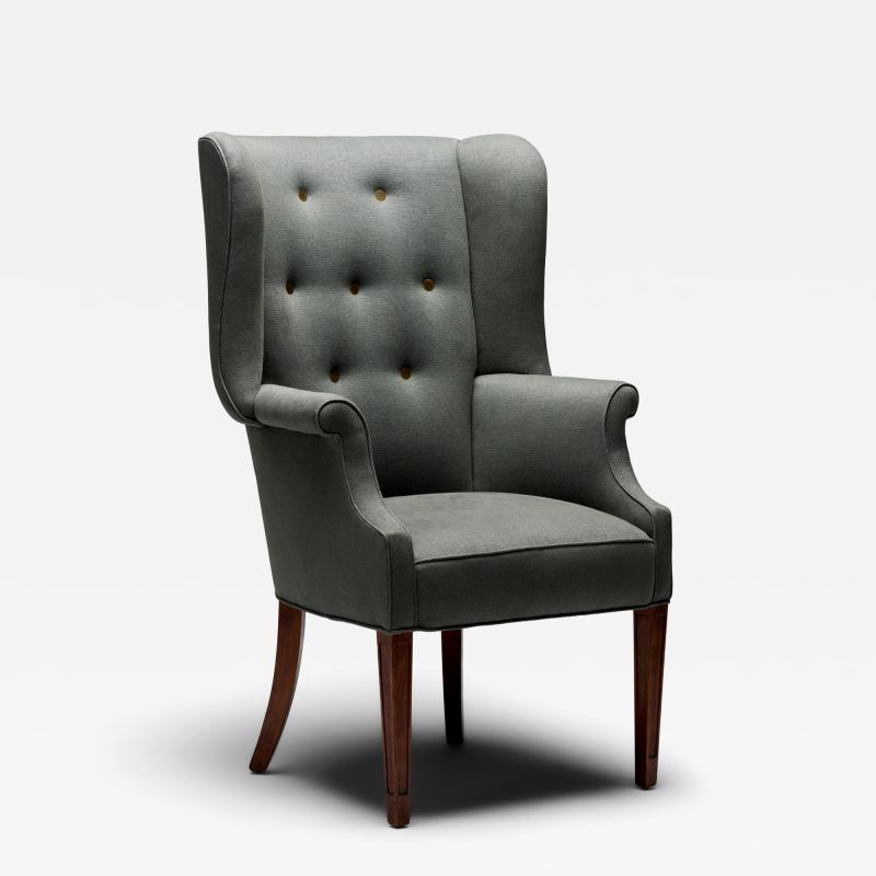 Mid Century Wingback Chair with Brass Buttons United States c 1950