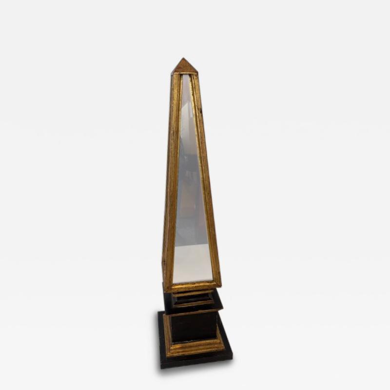 Mid Century ebonized and gold trim mirrored obelisk