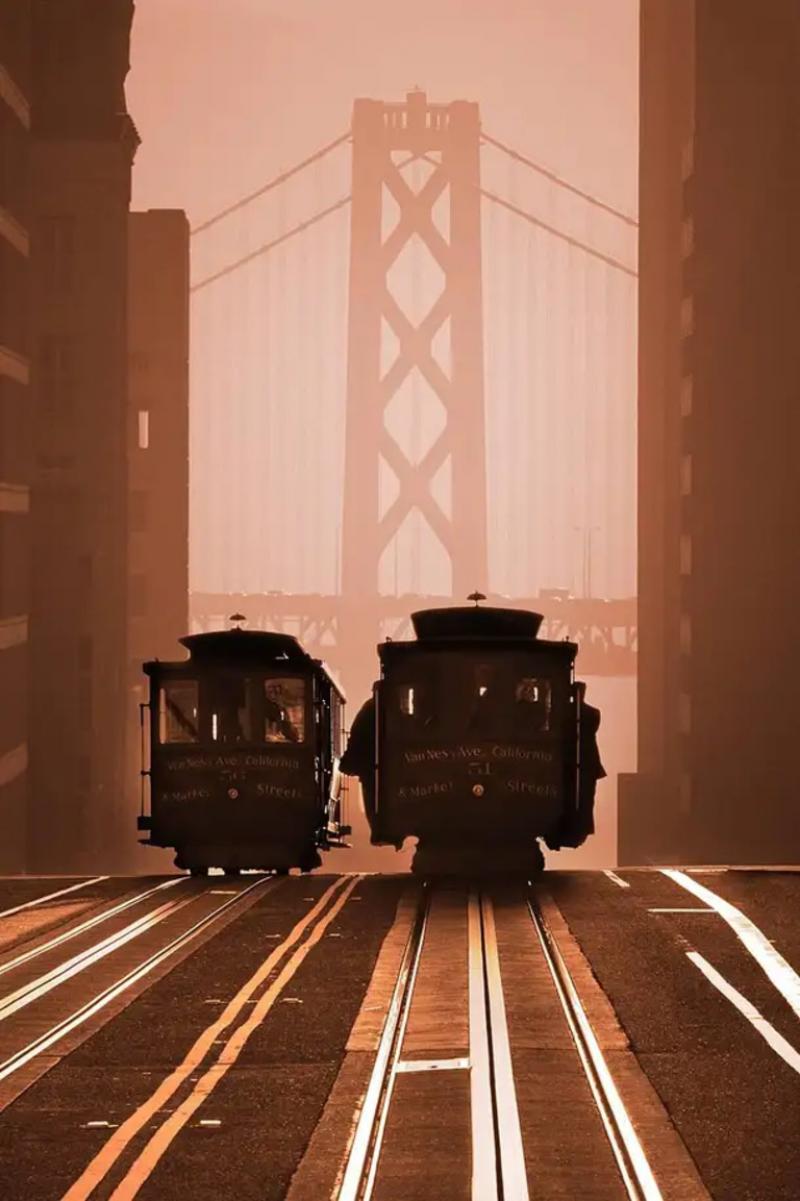 Mitchell Funk San Francisco Cable Cars against Bay Bridge