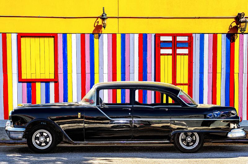 Mitchell Funk Vintage Car Against Colorful Striped Yellow Wall Primary Colors