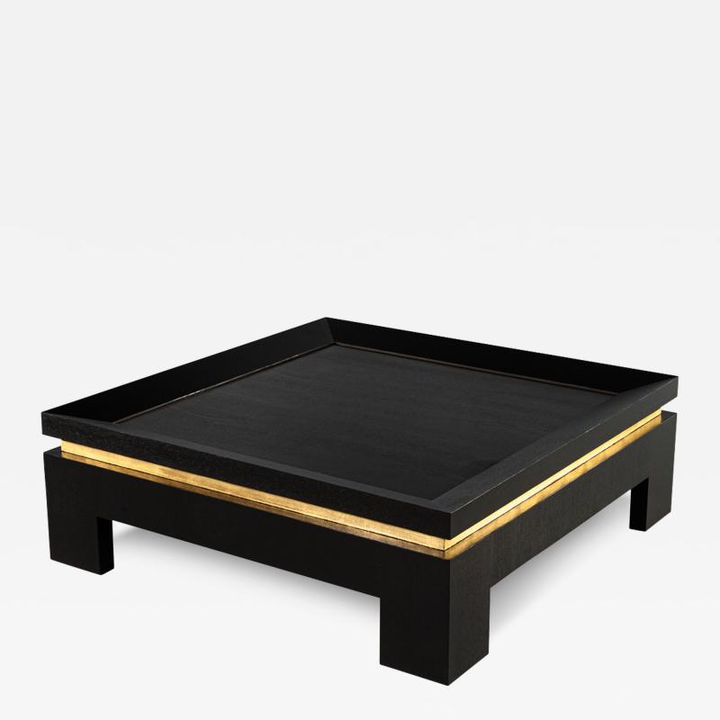 Modern Black Coffee Table with Gold Leaf Accents