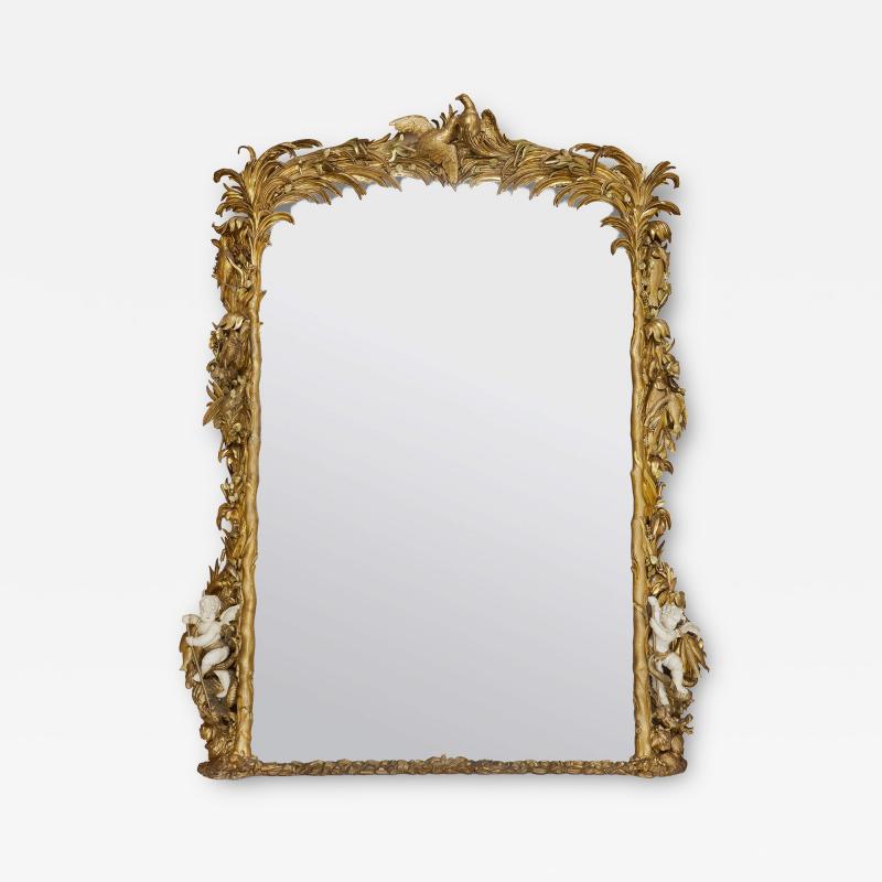 Monumental antique Rococo style carved giltwood mirror