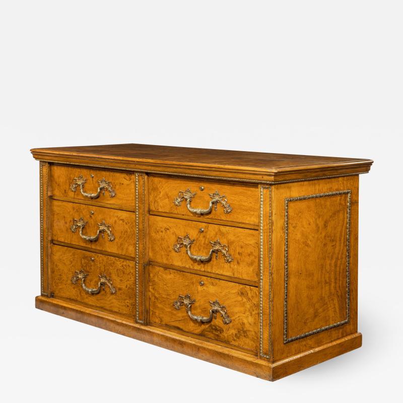 Morel and Seddon A fine George IV burr oak chest of drawers in the manner of Morel and Seddon