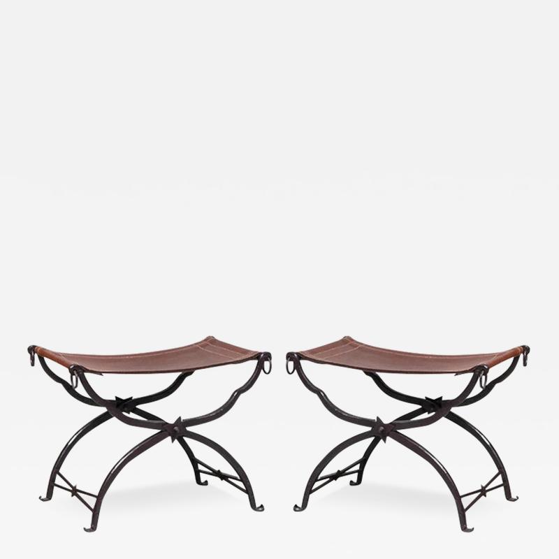 Morgan Colt PAIR OF WROUGHT IRON AND LEATHER CURULE STOOLS BY MORGAN COLT