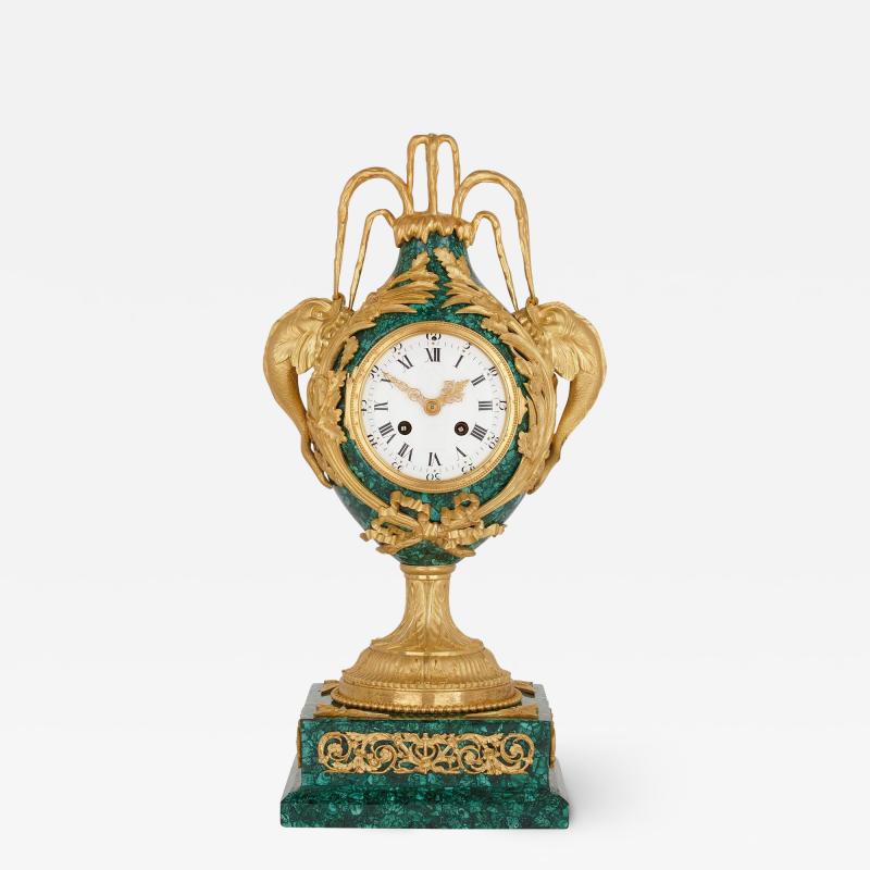 Neoclassical style gilt bronze and malachite mantel clock