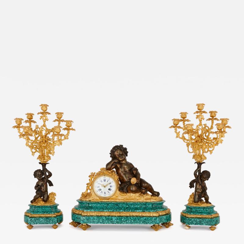 Neoclassical style malachite and gilt bronze mounted clock set