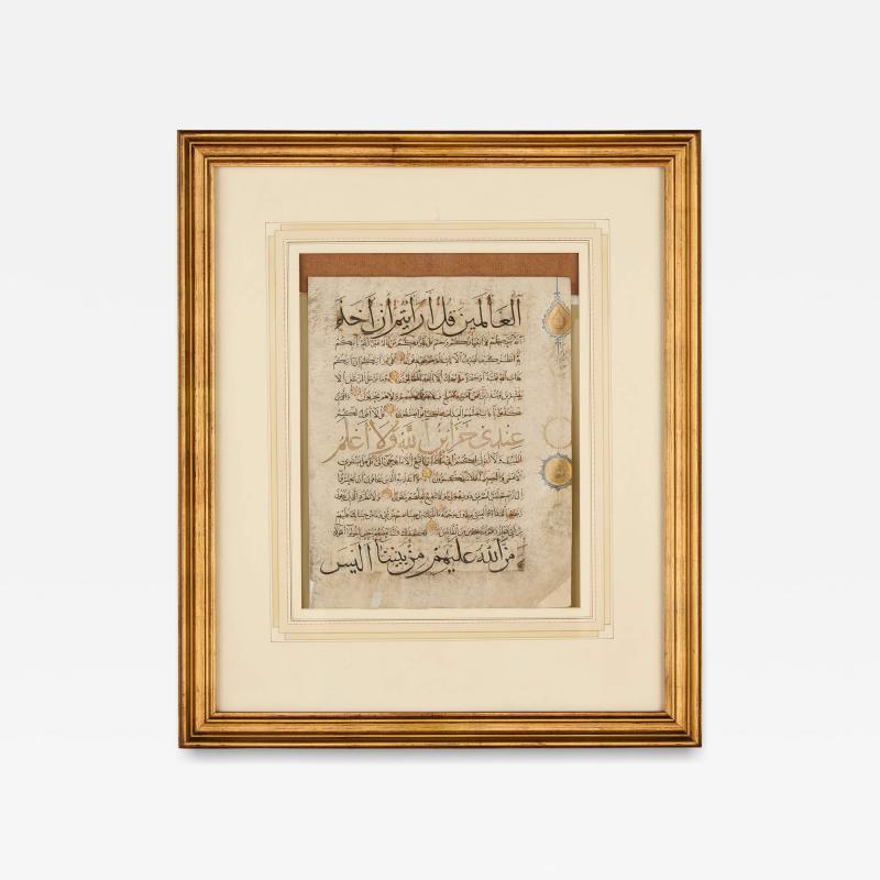 North African Qur anic manuscript leaf in Maghribi mujawhar script c 15thC