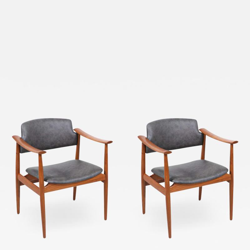 Norwegian Modern Sculpted Teak Arm Chairs