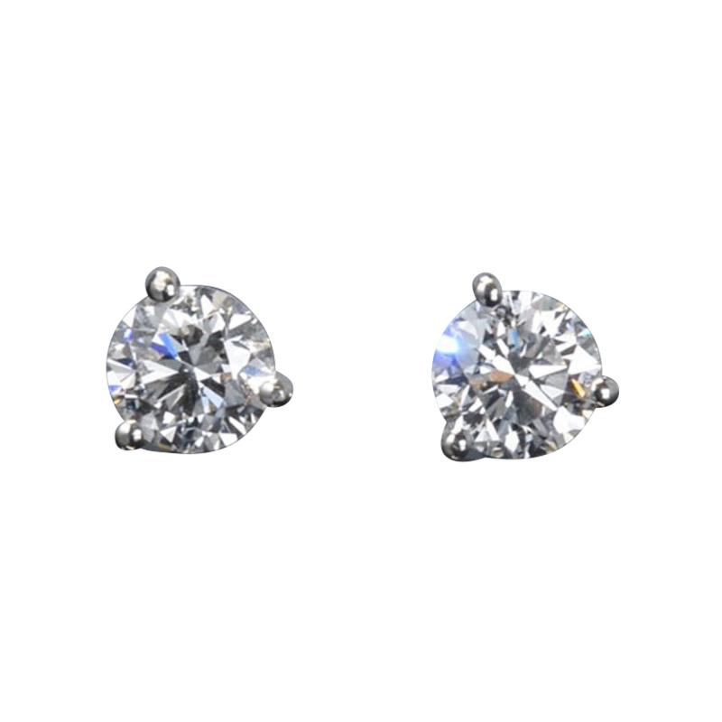 ONE PAIR OF ROUND DIAMOND EAR STUDS