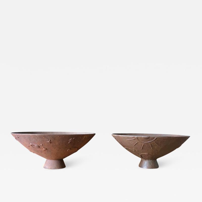 Olof Hult A pair of cast iron urns Mikrokosmos designed by Olof Hult