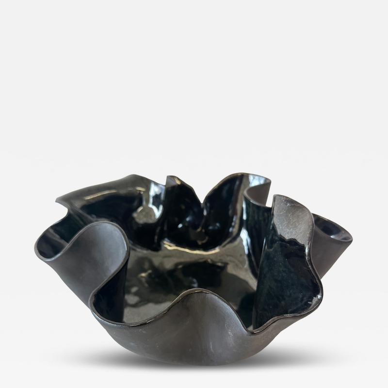 Organic ruffled edge bowl in deep blue black gloss finish 
