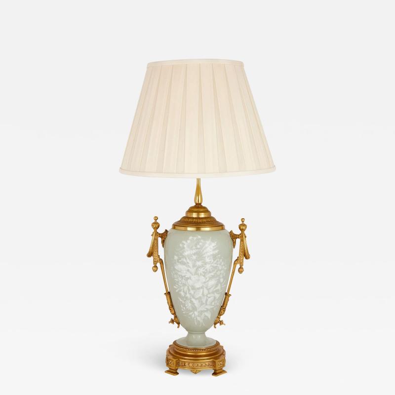 Ormolu mounted celadon porcelain and p te sur p te vase form lamp