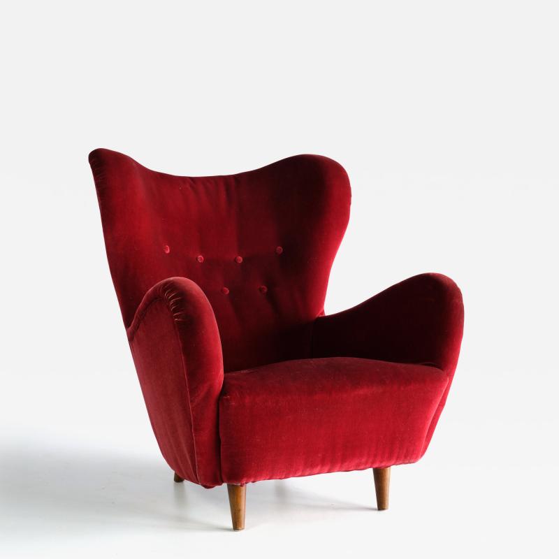 Otto Schulz Otto Schulz Wingback Chair in Red Velvet and Beech Boet Sweden 1946