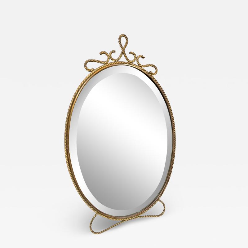 Oval Brass Vanity Mirror with Decorative Frame