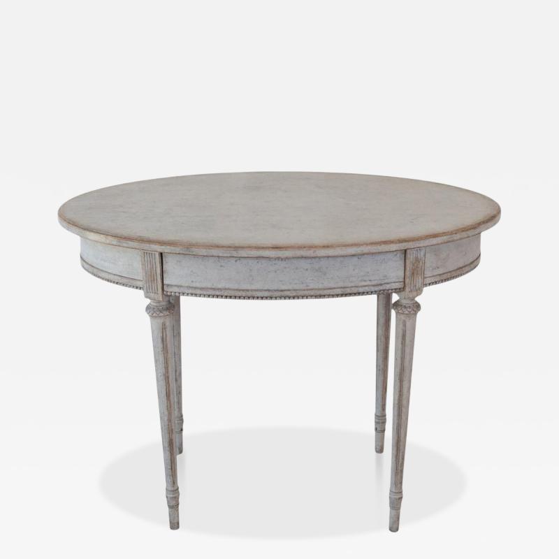 Oval table in the Gustavian style is finished in grey