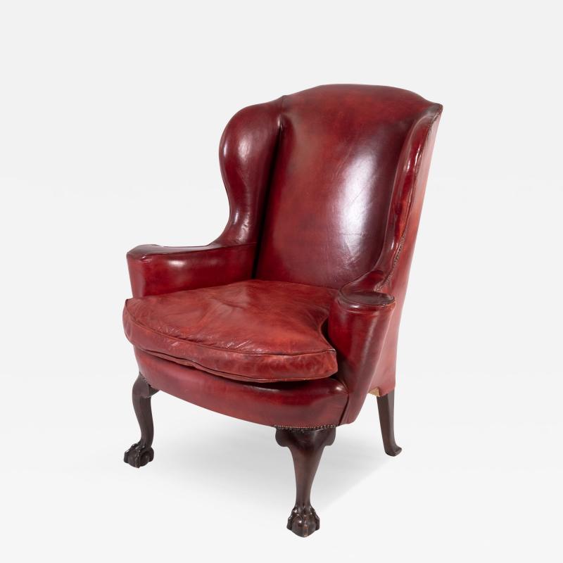 Ox Blood Red Leather Wing Chair with Loose Seat English Circa 1900 
