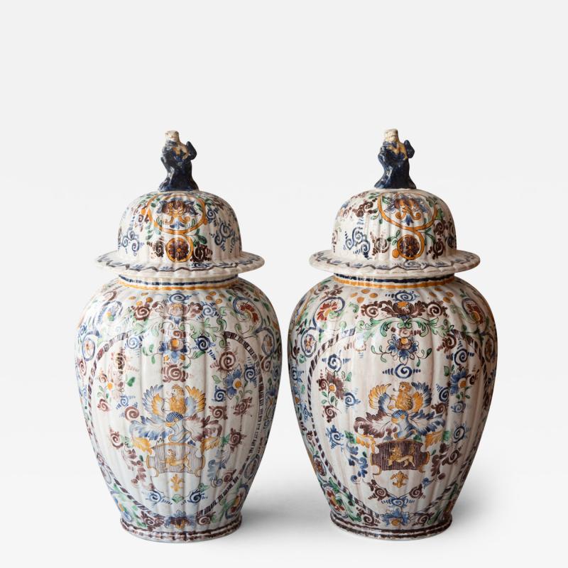 PAIR OF 19TH CENTURY FAIENCE BALUSTER LIDDED VASES