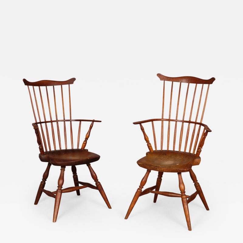 PAIR OF COMB BACK WINDSOR ARM CHAIRS WITH SHAPED SADDLE SEATS