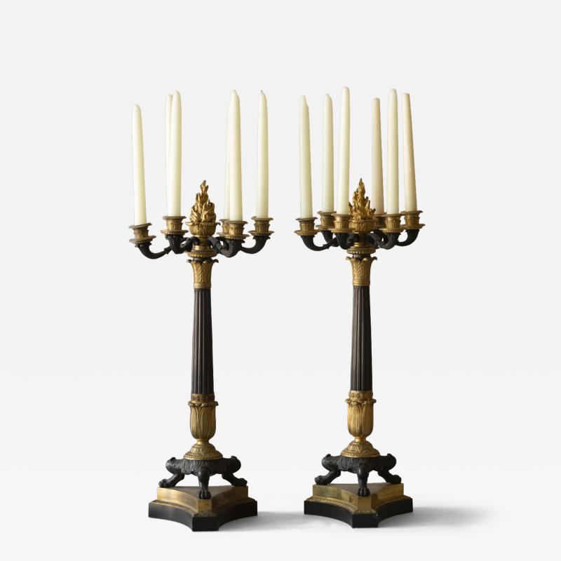 PAIR OF EARLY 19TH CENTURY PATINATED AND GILT BRONZE SIX LIGHT CANDELABRA