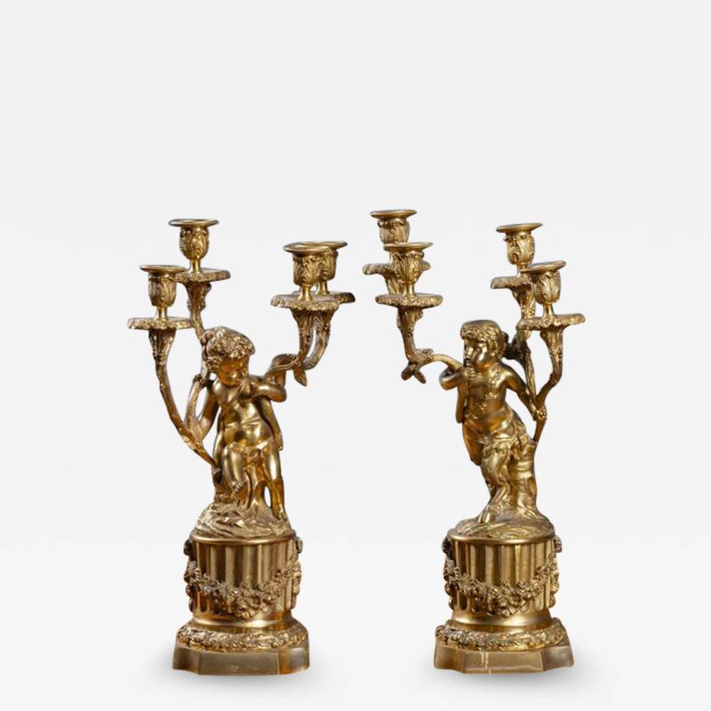 PAIR OF FRENCH DOR BRONZE CHERUB CANDELABRAS