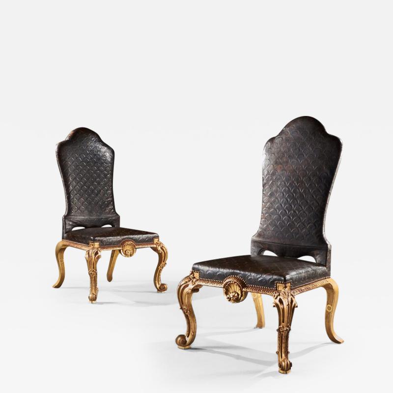 PAIR OF GEORGE I STYLE LATE 19TH CENTURY GILTWOOD AND LEATHER SIDE CHAIRS