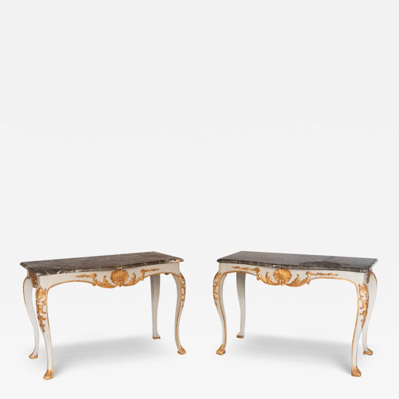 PAIR OF MID 18TH CENTURY GILT AND PAINTED CONSOLE TABLES