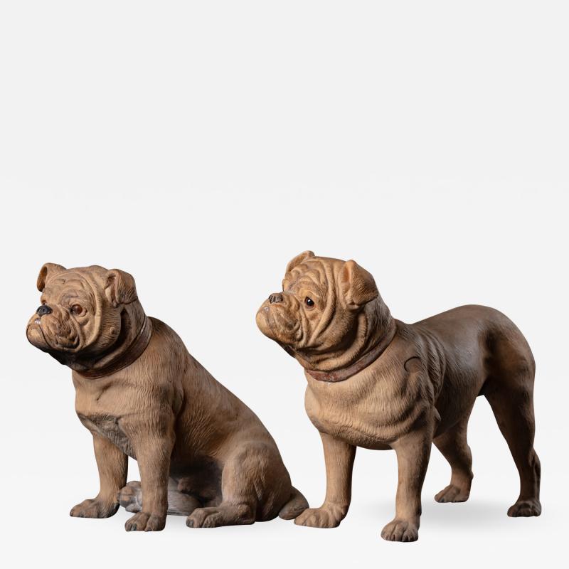 PAIR OF TERRACOTTA BULLDOGS