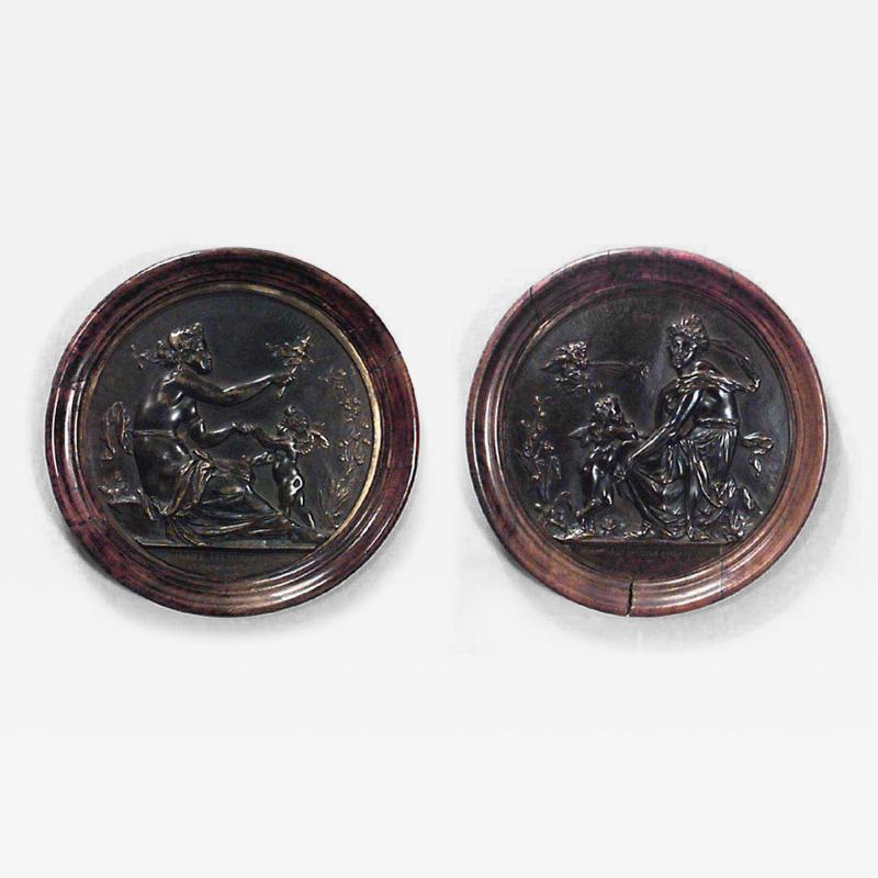 PAIR of French Victorian round walnut framed bronze wall plaques