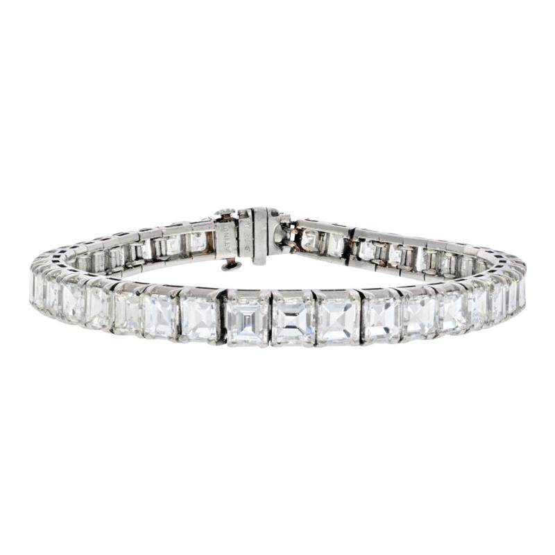 PLATINUM 21 CARAT SQUARE EMERALD CUT TENNIS BRACELET