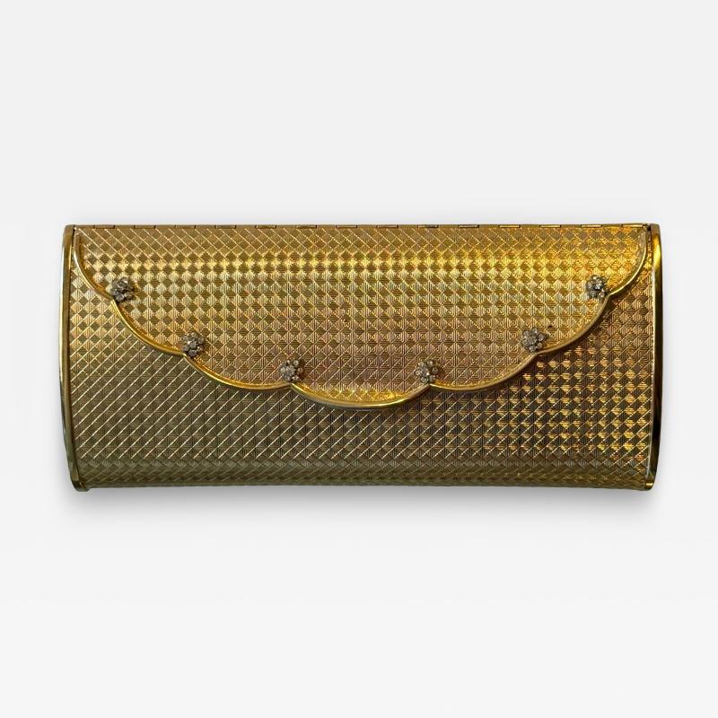 POLISHED GOLDTONE METAL CLUTCH WITH RHINESTONE FLORET ACCENTS