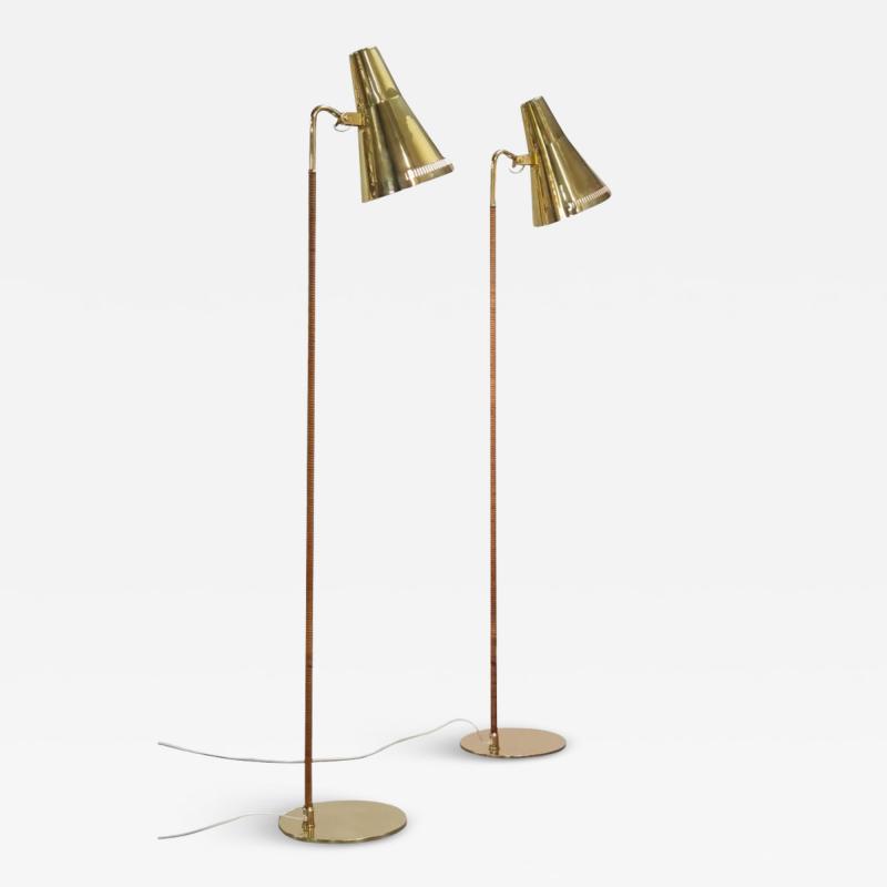 Paavo Tynell A Pair of Paavo Tynell Floor Lamps Model 9628 in Brass and Rattan Taito 1950s