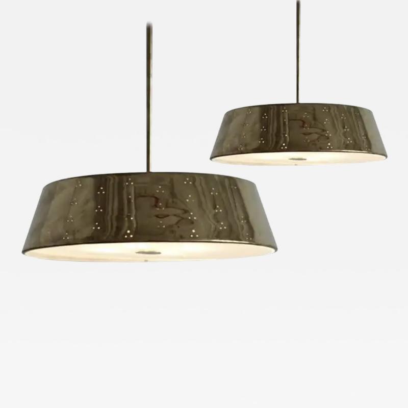 Paavo Tynell A pair of large pendants by Paavo Tynell for Idman