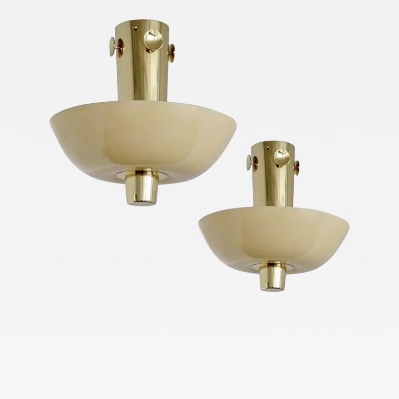 Paavo Tynell A pair of rare available Model 9052 designed by Paavo Tynell