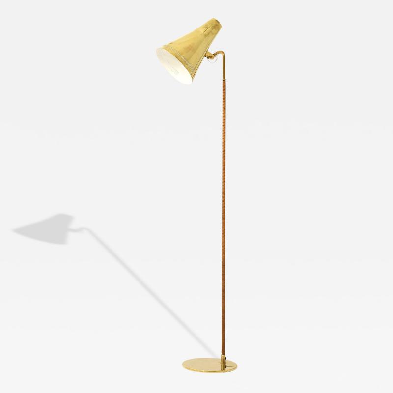 Paavo Tynell Floor Lamp in Brass and Cane by Paavo Tynell 1950s