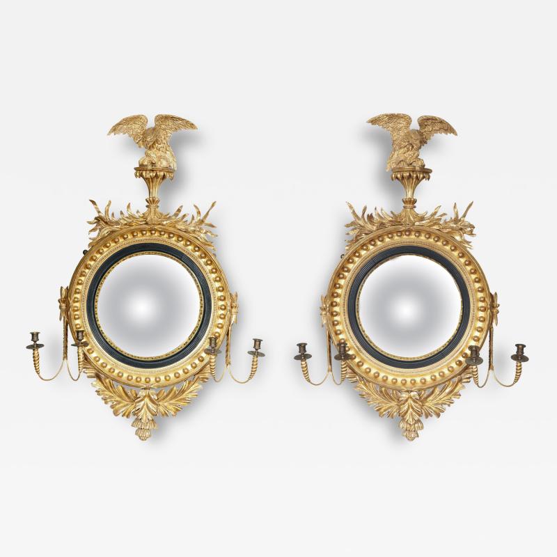 Pair Of Regency Giltwood And Ebonized Convex Girandole Mirrors