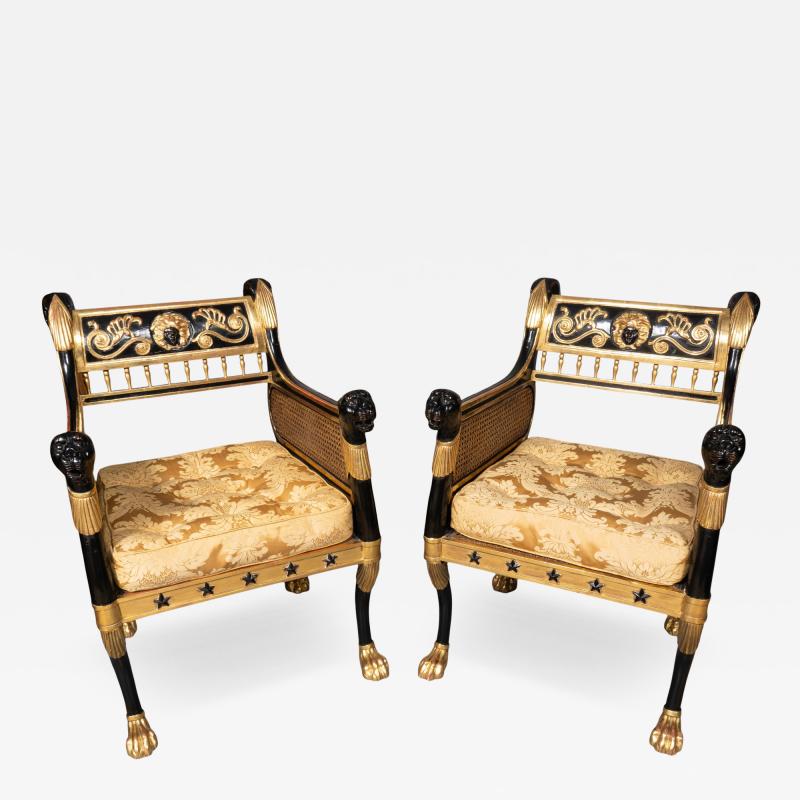 Pair Of Regency Style Ebonized And Parcel Gilt Armchairs