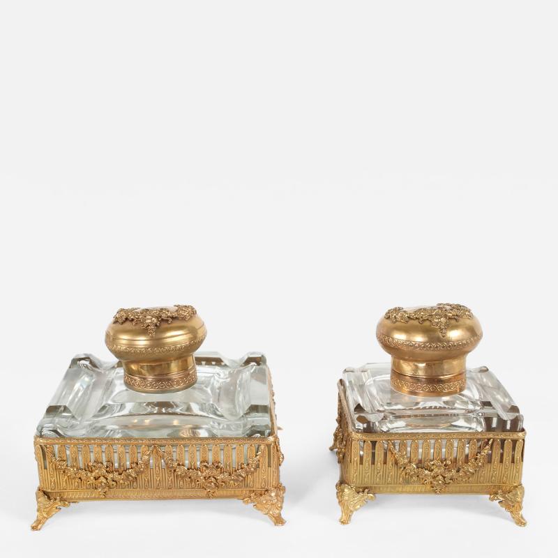 Pair Ornately Gilt Brass Framed Footed Glass Inkwells
