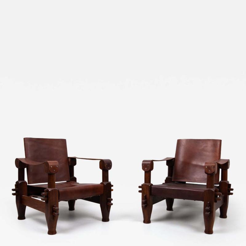 Pair of 1960s hardwood and leather armchairs