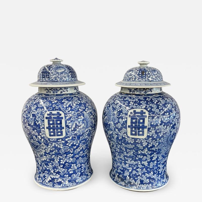 Pair of 19th Century Blue and White Lidded Temple Jars Urns