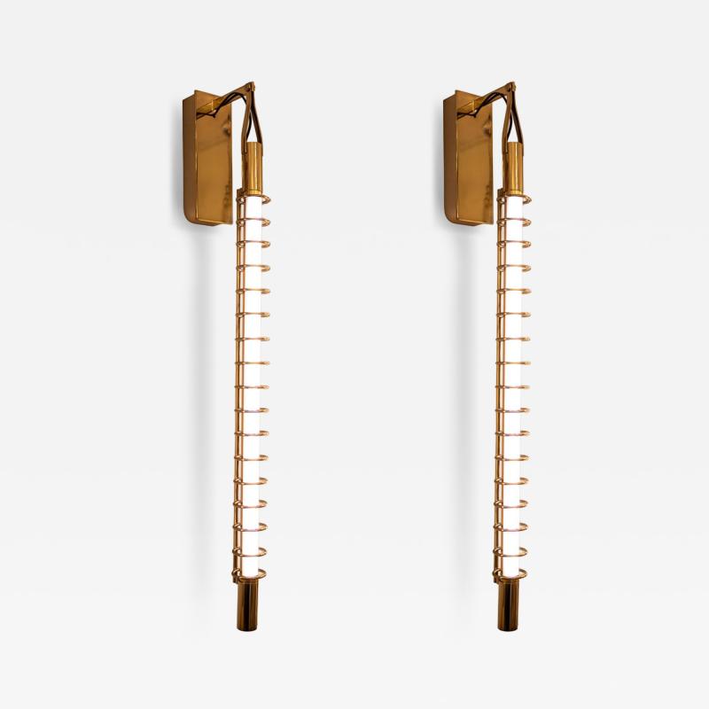 Pair of Albini 17 wall lights brass rings and tube light