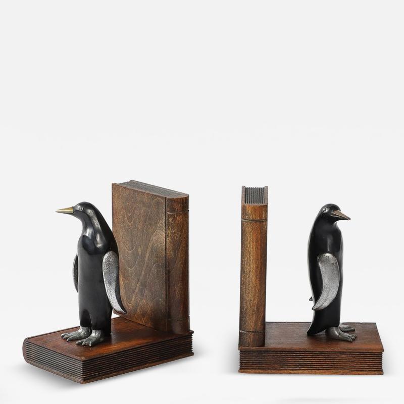 Pair of Art Deco Walnut Black Enamel Brass Sculptural Penguin Bookends